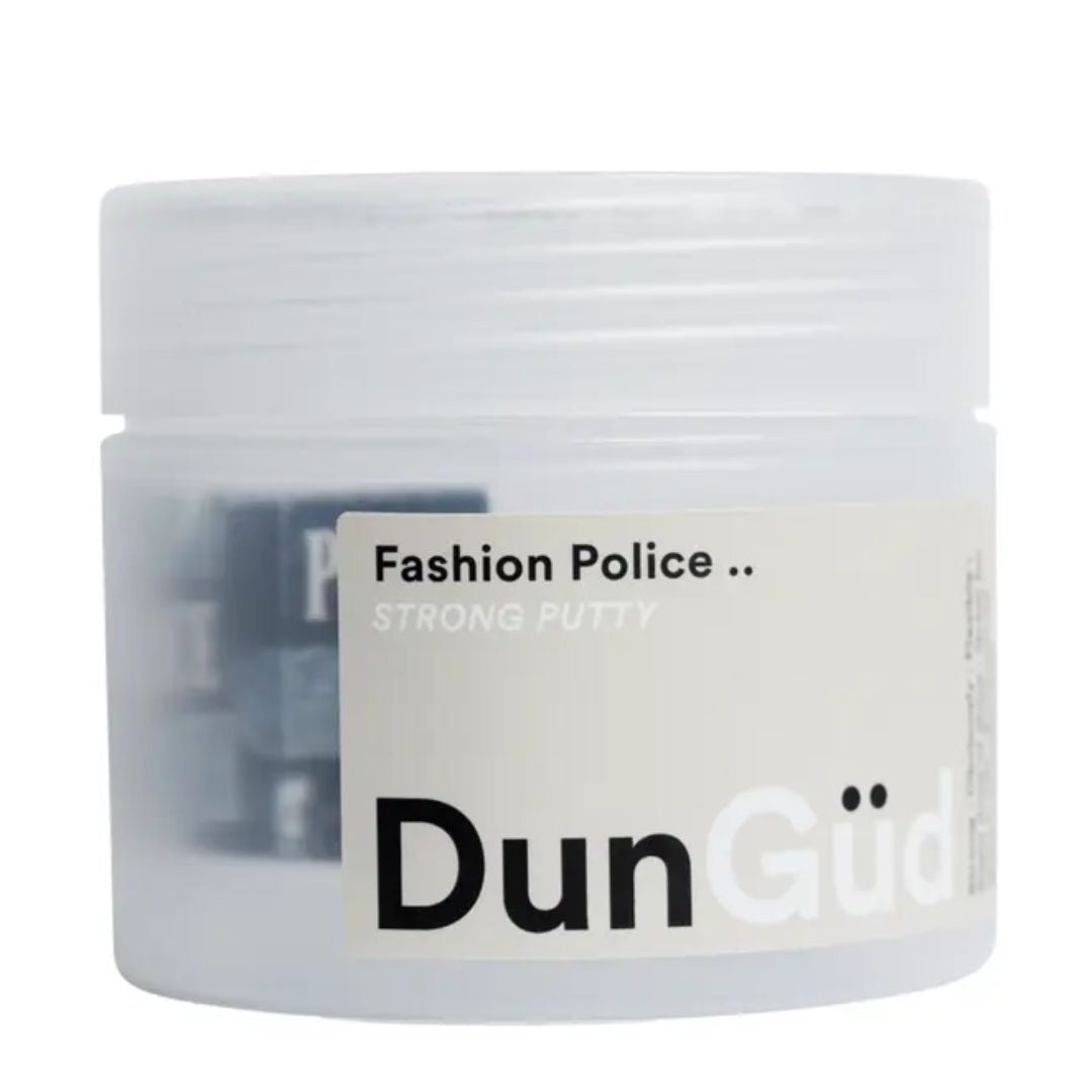 Jar of DunGud fashion police strong putty on a white background