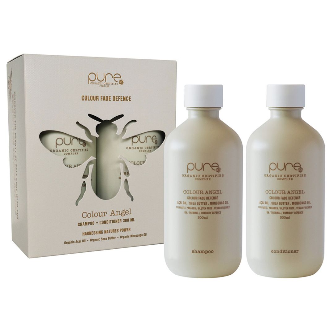 Two bottles of 'pure' shampoo and conditioner with a packaging box on a white background