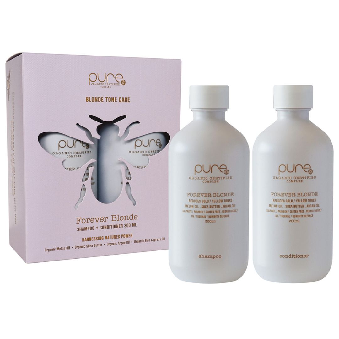 Two bottles of 'pure' shampoo and conditioner with a packaging box on a white background