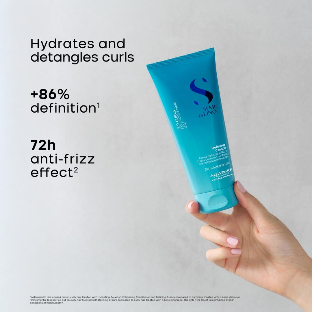 A hand holds a turquoise tube of Aisance Anti-Frizz Curl Smoother against a light gray background, with promotional text on the left highlighting hydration, definition, and anti-frizz benefits.