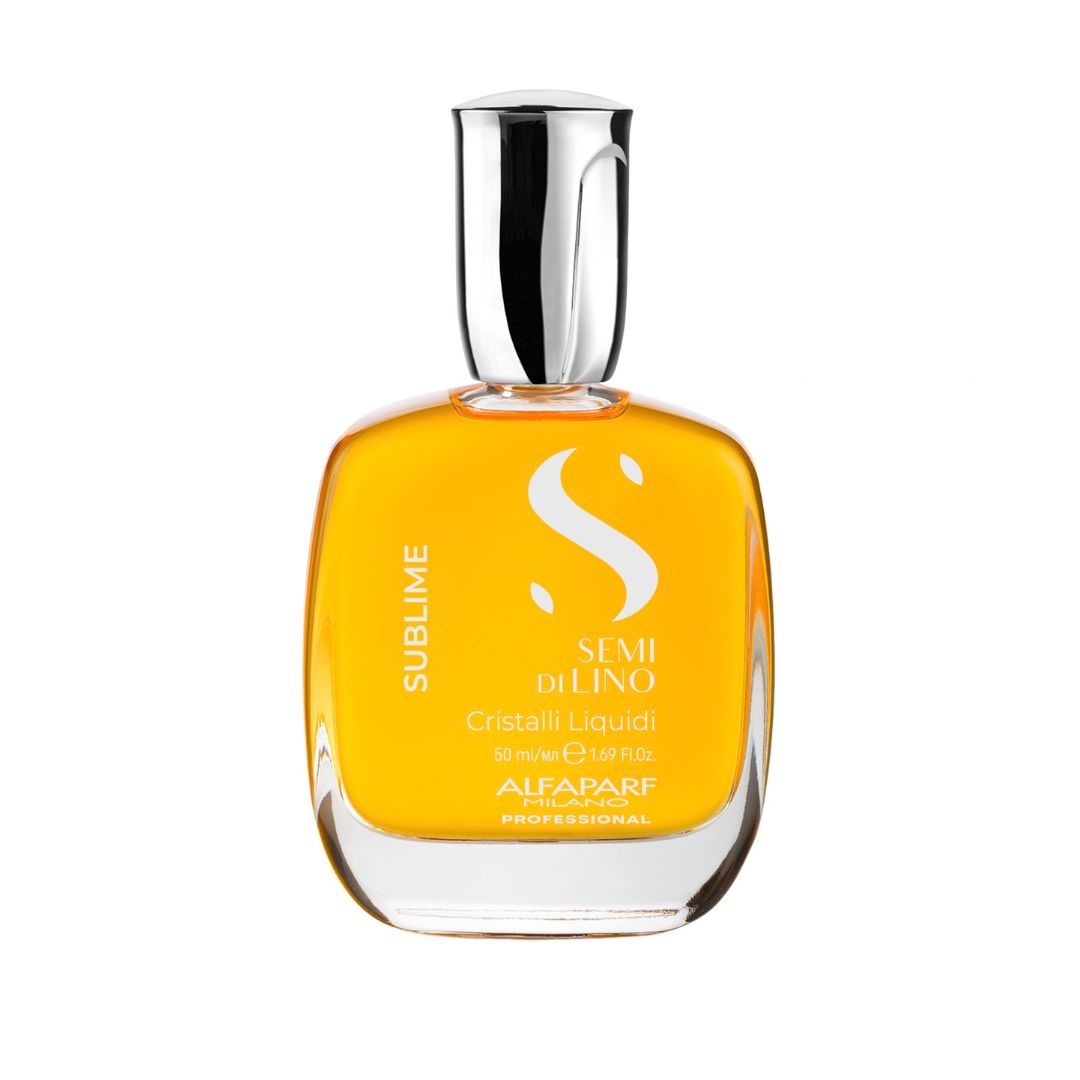 A bottle of Alfaparf SUBLIME Semi di Lino Cristalli Liquidi hair crystals, featuring a clear glass bottle filled with golden-yellow liquid and topped with a reflective silver cap, set against a plain white background.