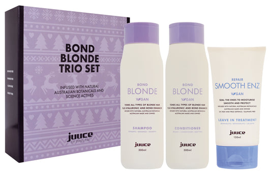 Juice of Melbourne Bond Blonde Trio Set featuring a purple patterned box, a shampoo bottle, a conditioner bottle, and a leave-in treatment tube on a white background.