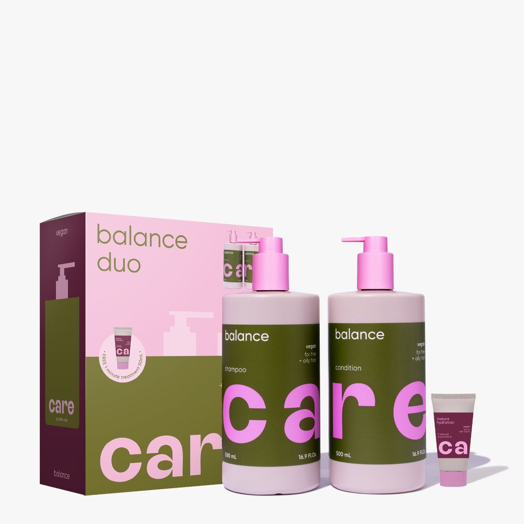 Balance Duo shampoo and conditioner set with its packaging box and a small tube, featuring olive green and pink labels on a clean white background.