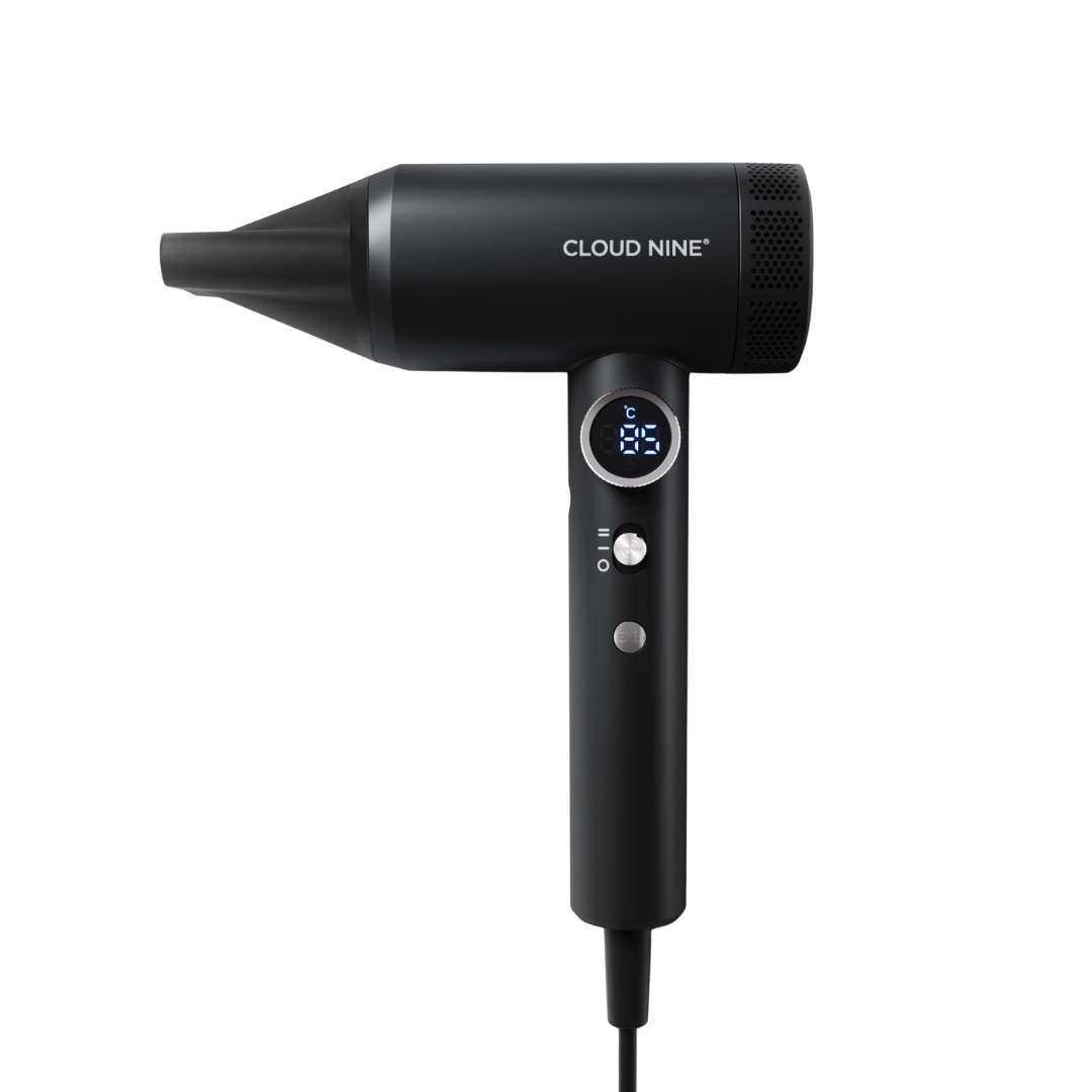 A black handheld hair dryer with a digital display showing 80 degrees and the brand name CLOUD NINE printed on the side, set against a plain white background.