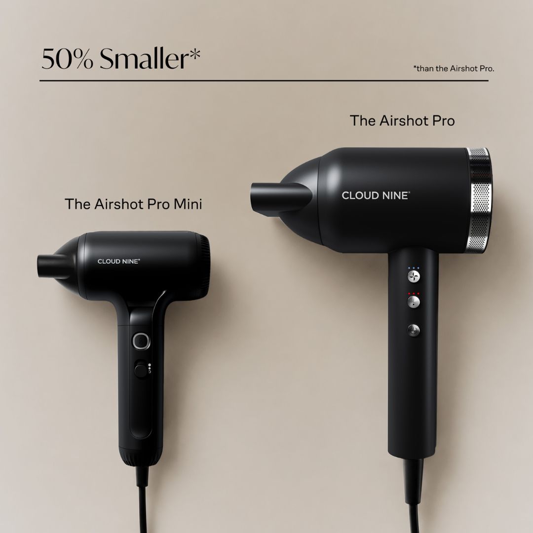 Two black hair dryers from Cloud Nine are shown against a warm beige background, with text labels identifying them as The Airshot Pro Mini and The Airshot Pro. The image includes the headline '50% Smaller*' at the top.