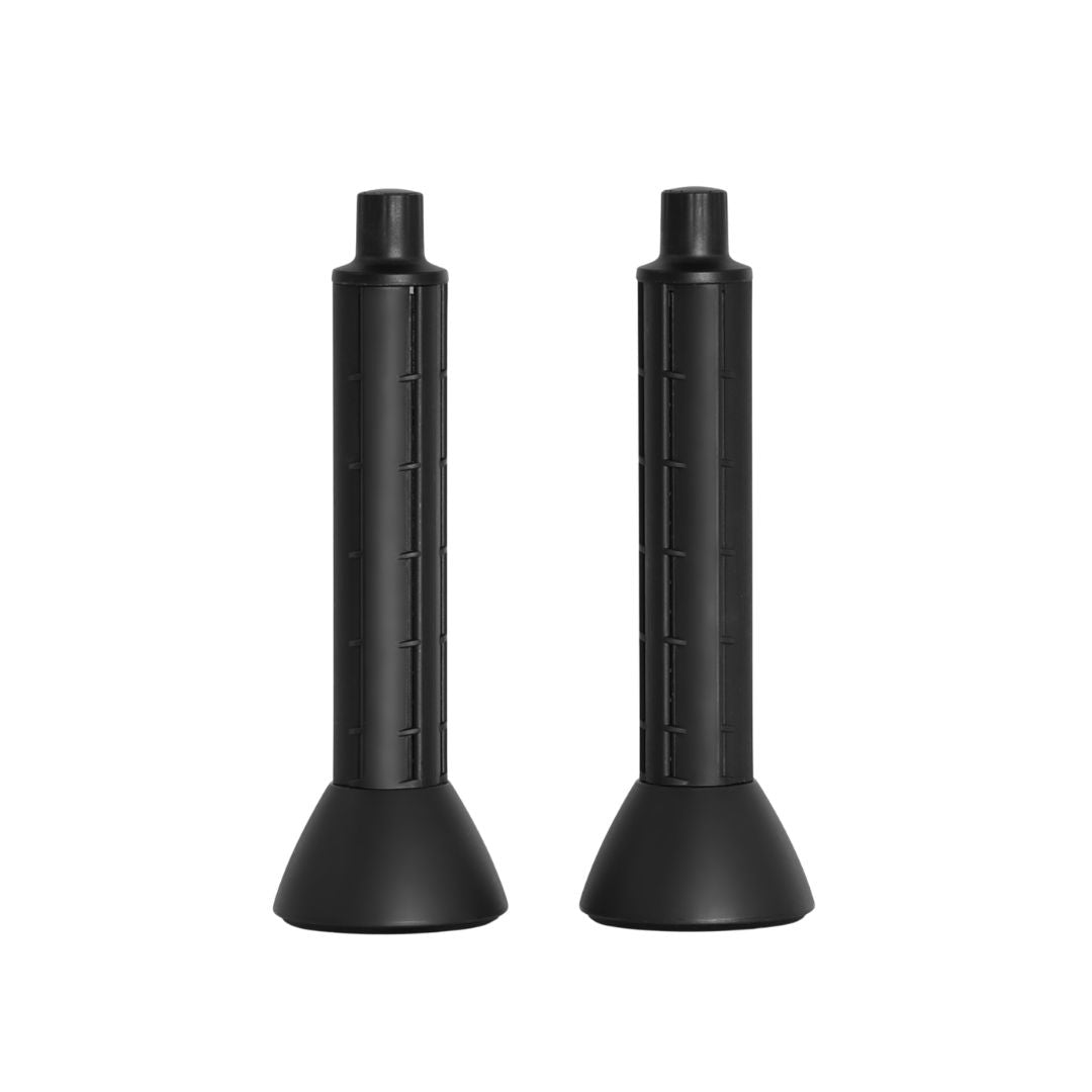 Two black cylindrical objects on a white background