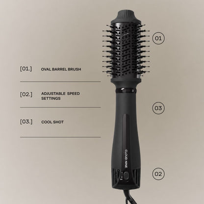 A black oval barrel hair brush attachment shown on a light beige background with feature callouts: oval barrel brush, adjustable speed settings, and cool shot.