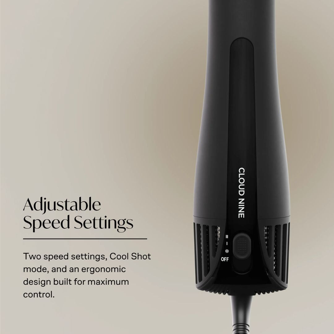 A black hair dryer shown on a warm beige background with text reading 'Adjustable Speed Settings' and 'Two speed settings, Cool Shot mode, and an ergonomic design built for maximum control.' The dryer is branded 'CLOUD NINE.