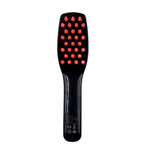 Black massage brush with red nodes on a white background