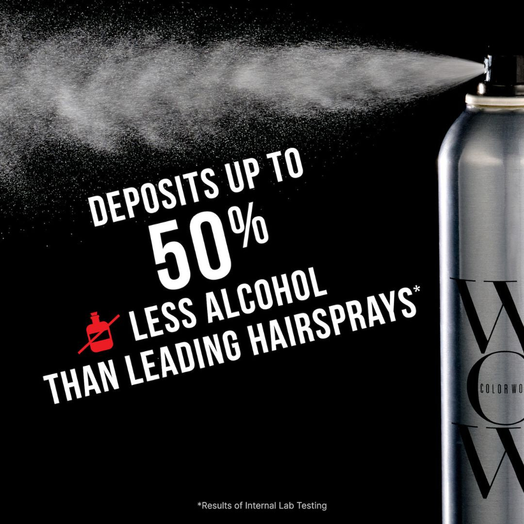 Can of hair spray with text claiming less alcohol content compared to leading products on a black background.
