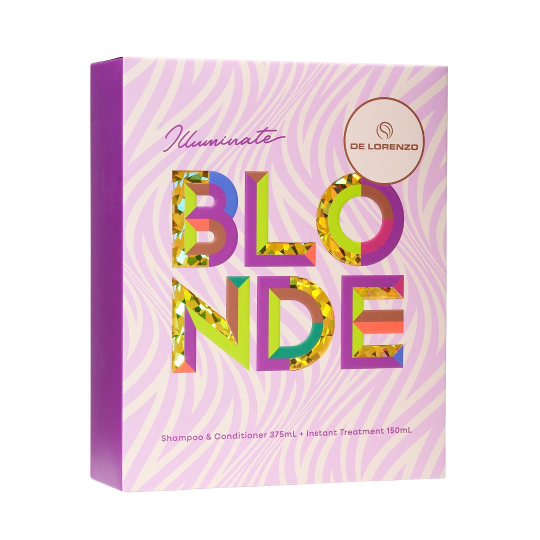 A boxed haircare product on a plain white background. The package is predominantly pink and purple with a wavy pattern, large multicolored 'BLO' and 'NDE' lettering, and a circular 'DE LORENZO' logo near the top right.