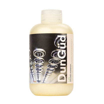 Bottle of Dunqud shampoo with a white background