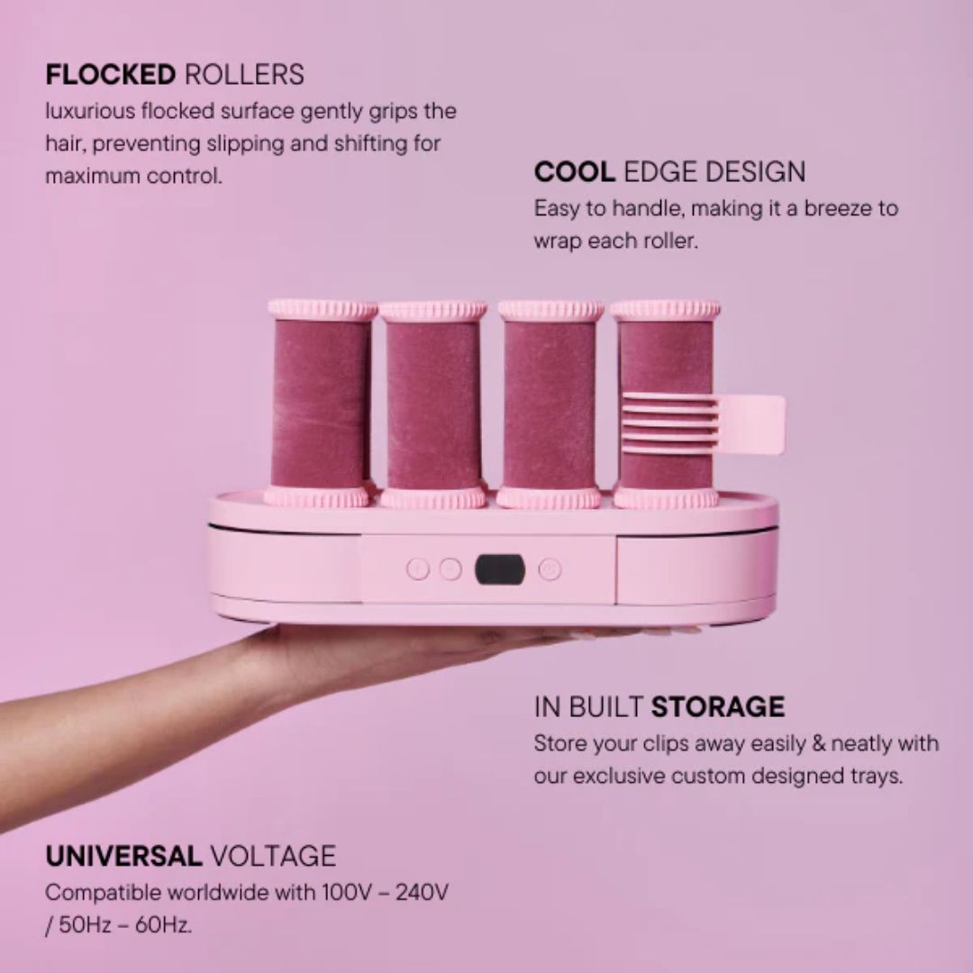 Pink hair roller set with text on a pink background