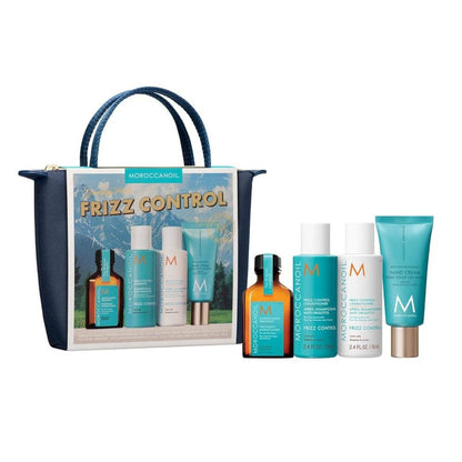 Moroccanoil frizz control product set with a tote bag on a white background