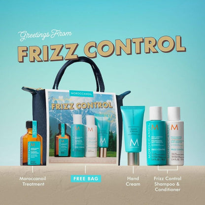 Moroccanoil Frizz Control gift set featuring a black tote bag, a bottle of amber-colored treatment, a free bag, hand cream, and shampoo and conditioner bottles, arranged on a light blue background with the text 'Greetings From FRIZZ CONTROL'.
