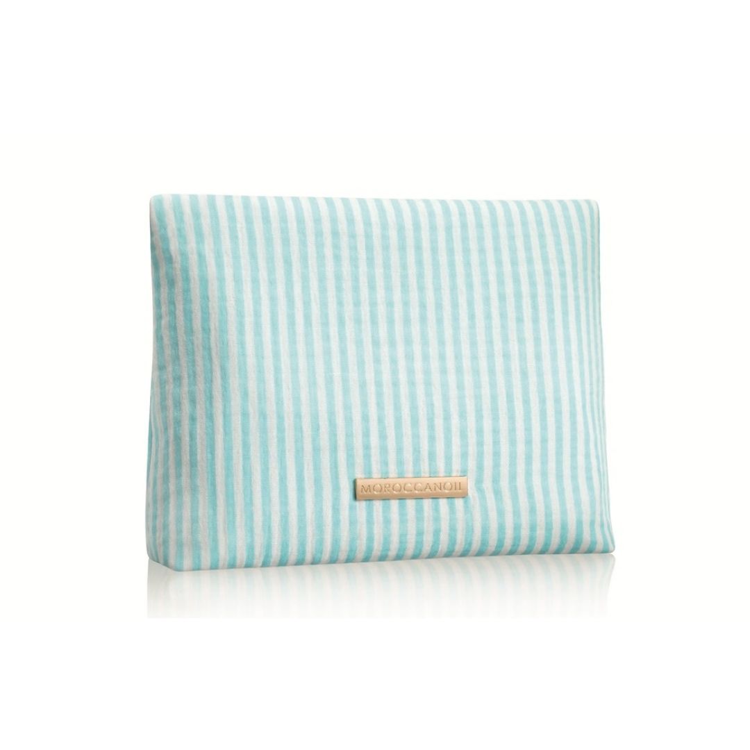 A rectangular fabric pouch with vertical mint green and white stripes, featuring a small gold-tone metal brand plaque that reads 'MISOGLAM'. The pouch is photographed on a clean white background with a soft reflection underneath.