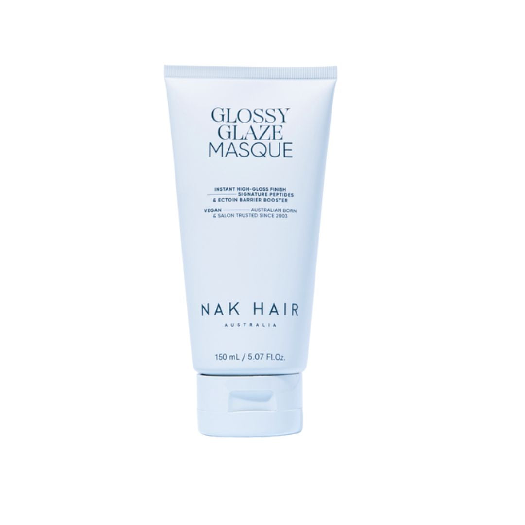 A 150 mL squeeze tube of NAK HAIR Glossy Glaze Masque, featuring a pale icy blue design with dark blue text, set against a solid white background.