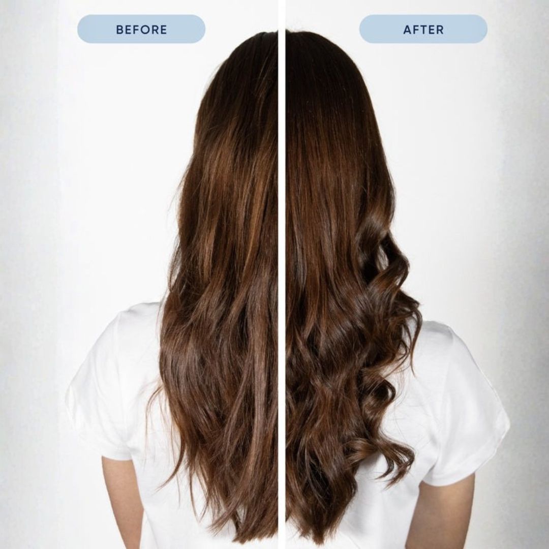 Before and after comparison of a woman's long brown hair, shown from the back. The left side is labeled 'BEFORE' and shows straighter, slightly frizzy hair, while the right side is labeled 'AFTER' and shows smoother, shinier, and more voluminous wavy hair.