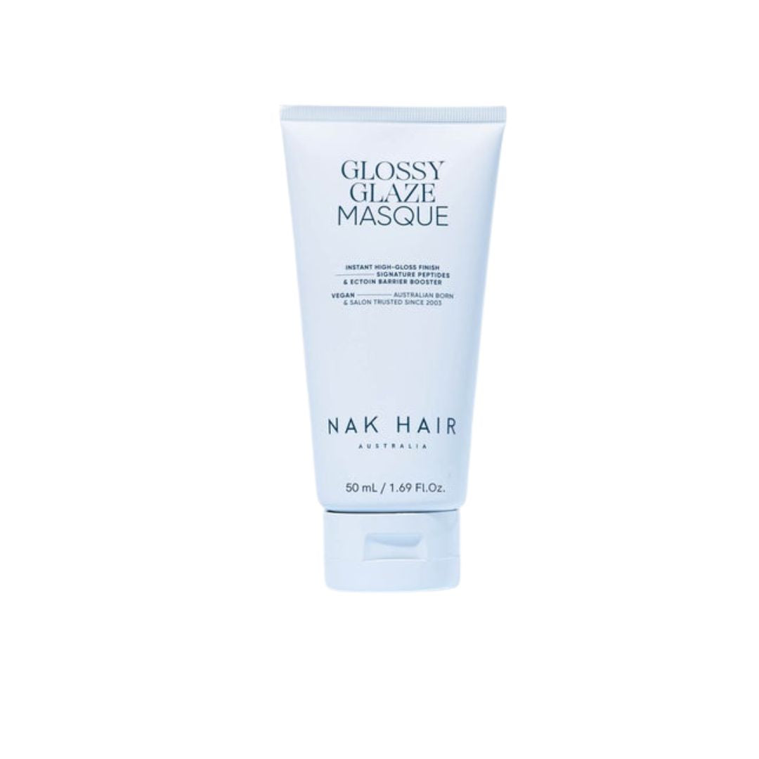A 50 mL squeeze tube of Nak Hair Glossy Glaze Masque, featuring a light blue and white design with black text, centered on a plain white background.