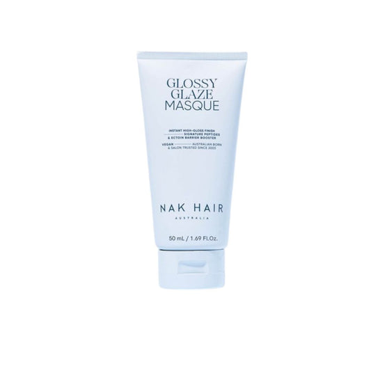 A 50 mL squeeze tube of Nak Hair Glossy Glaze Masque, featuring a light blue and white design with black text, centered on a plain white background.