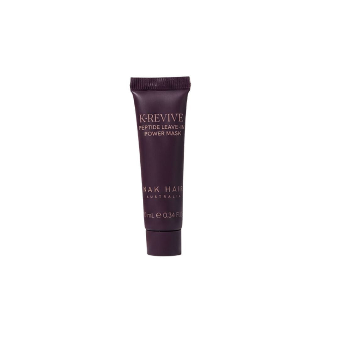 A dark plum purple squeeze tube of Krevive Peptide Leave-in Power Mask by Naked Hair Australia, centered on a plain white background.