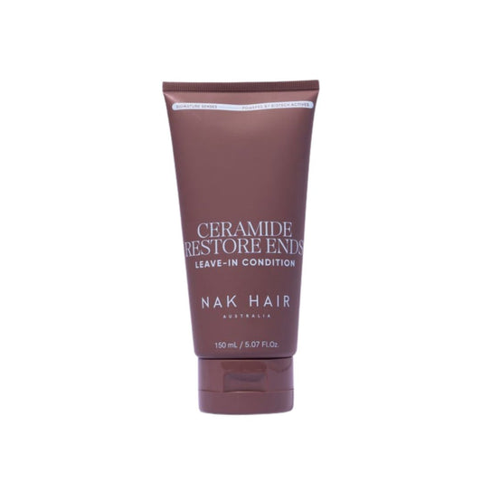 A 150 mL squeeze tube of NAK HAIR Ceramide Restore Enrich Leave-In Condition, in a dark reddish-brown color with white text, on a plain white background.
