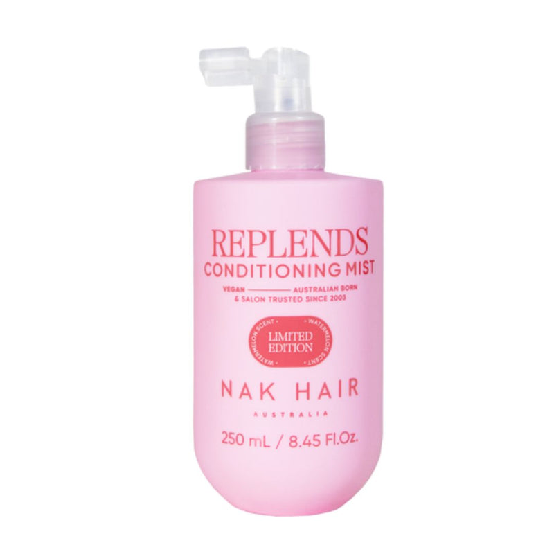 Pink bottle of Replends Conditioning Mist by Nak Hair on a white background