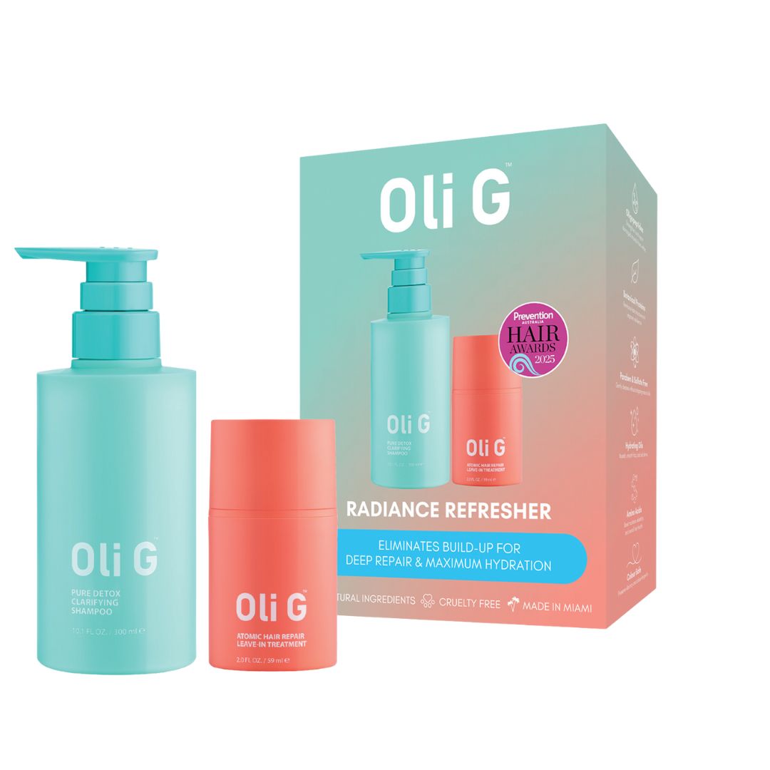Oli G hair care product set with bottles and packaging on a white background