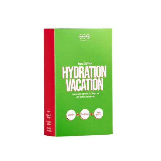 A green and red box of O-O Oils Hydration Vacation Hair Care Set on a plain white background.