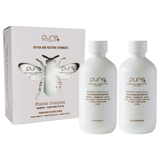Two bottles of 'pure' Fusion Complex shampoo and conditioner with packaging on a white background
