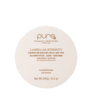 Round container of 'pure' Lamellar Eternity conditioner on a white background