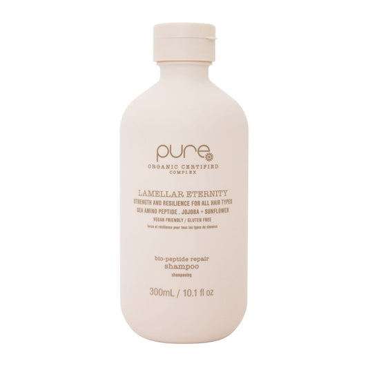 Beige shampoo bottle labeled 'pure' on a white background