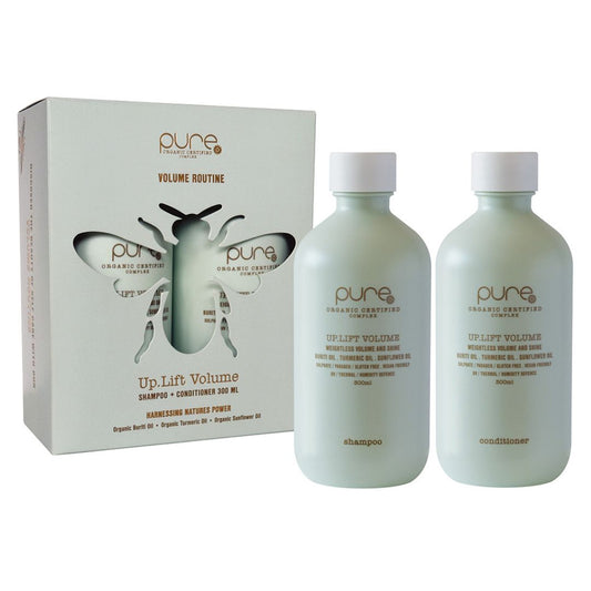 Two bottles of 'pure' shampoo and conditioner with a packaging box on a white background