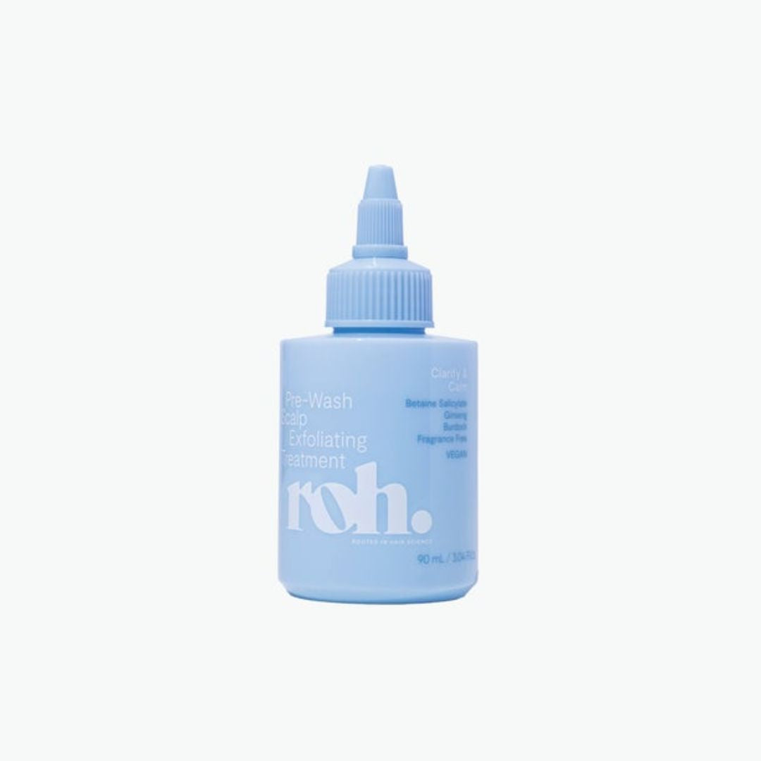 Blue bottle with a pump dispenser on a white background