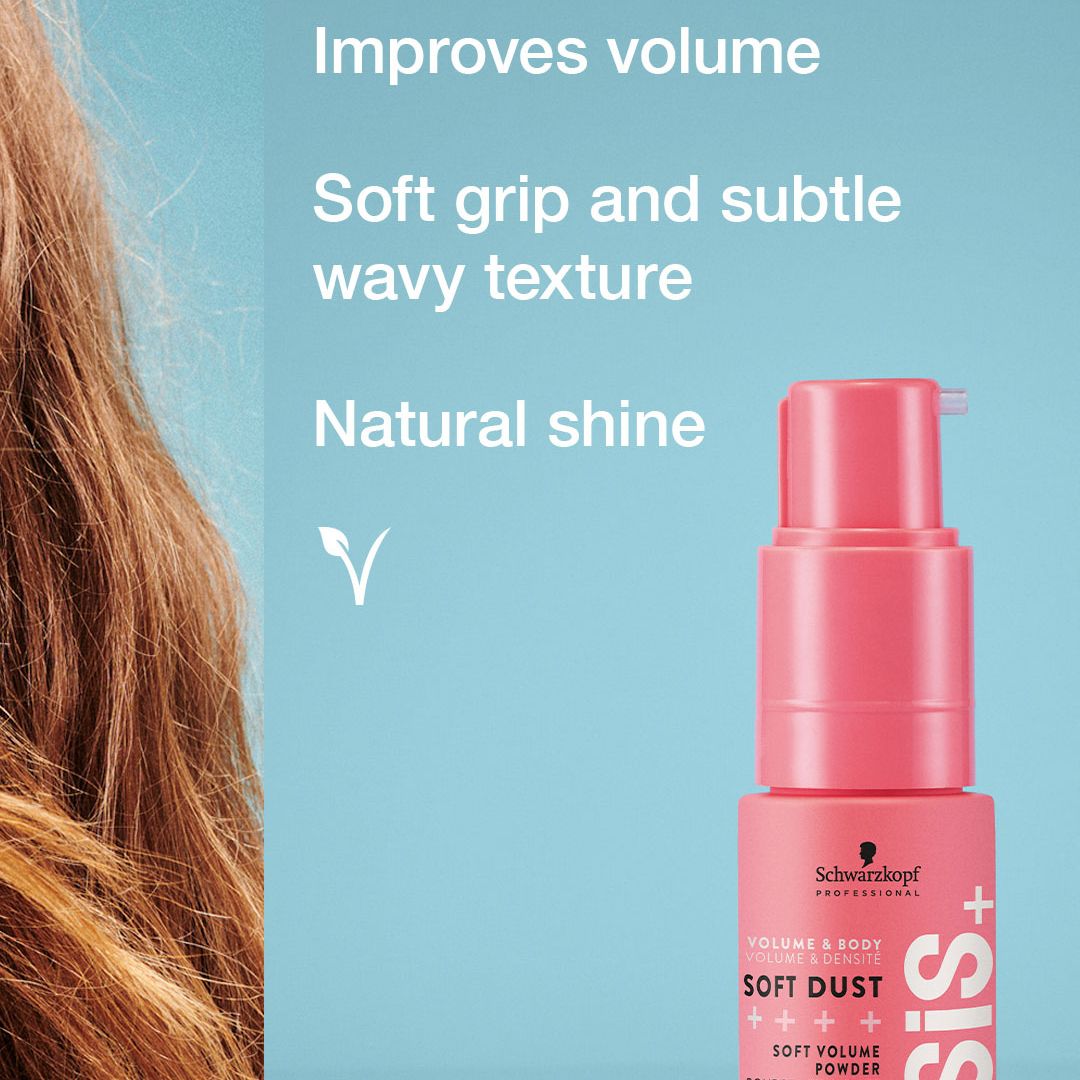 Pink hair product bottle with text on a blue background