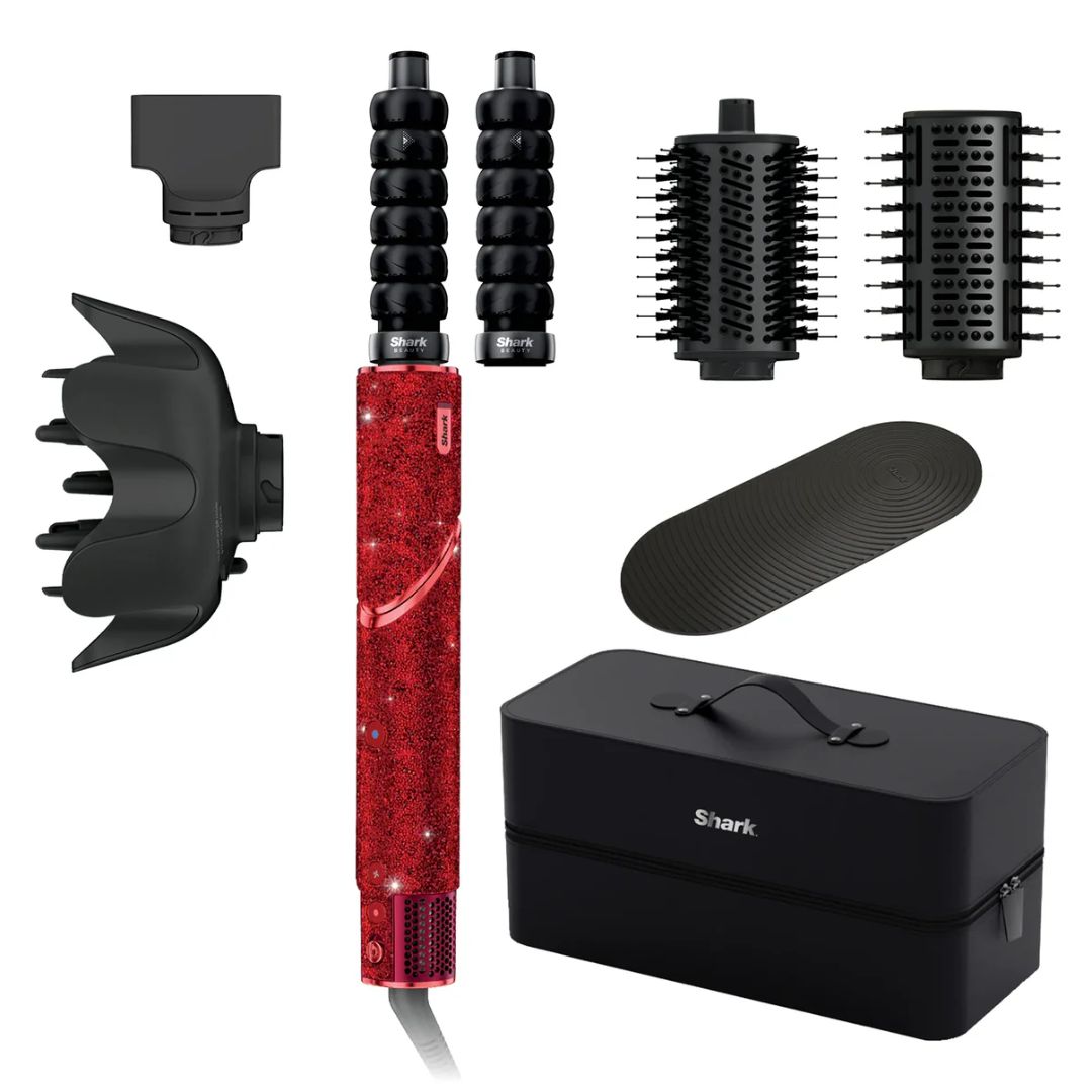 Hair styling tool set with attachments and a black case on a white background