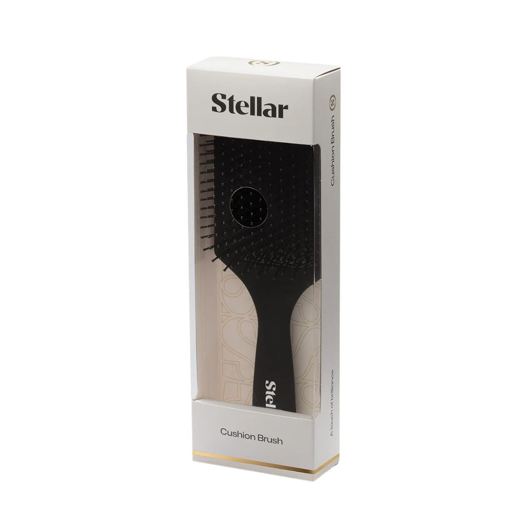 Stellar cushion brush packaging on a white background
