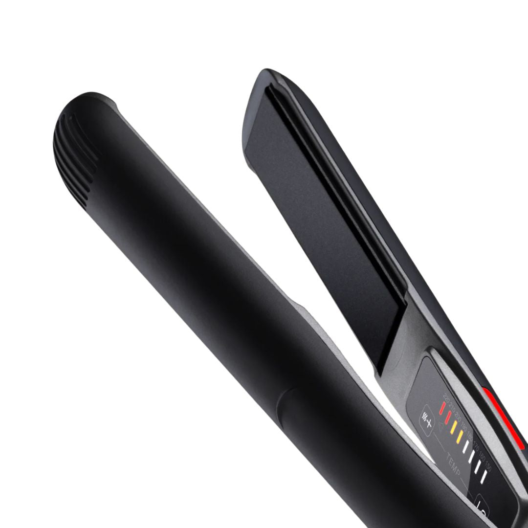 Black hair straightener on a white background