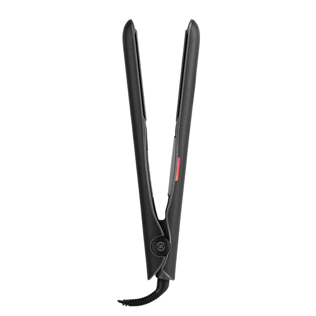 Black hair straightener on a white background