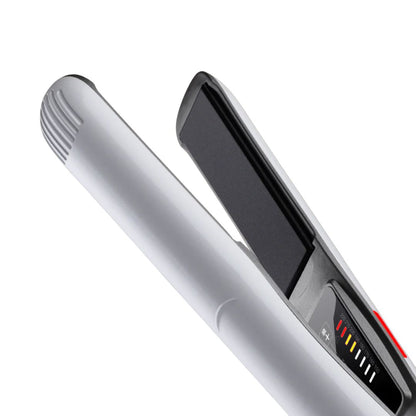 Silver hair straightener on a white background