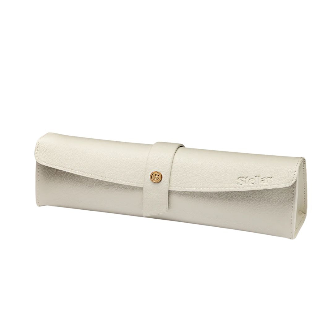 White eyeglass case with gold clasp on a white background