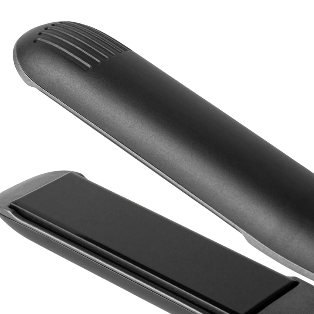 Two black plastic components on a white background