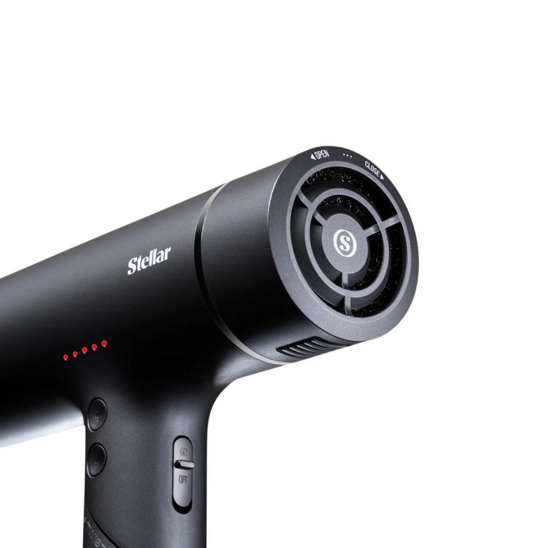 Black hair dryer with 'Stellar' branding on a white background