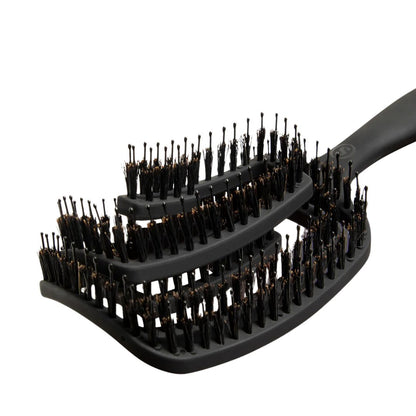 Black hairbrush with bristle design on a white background