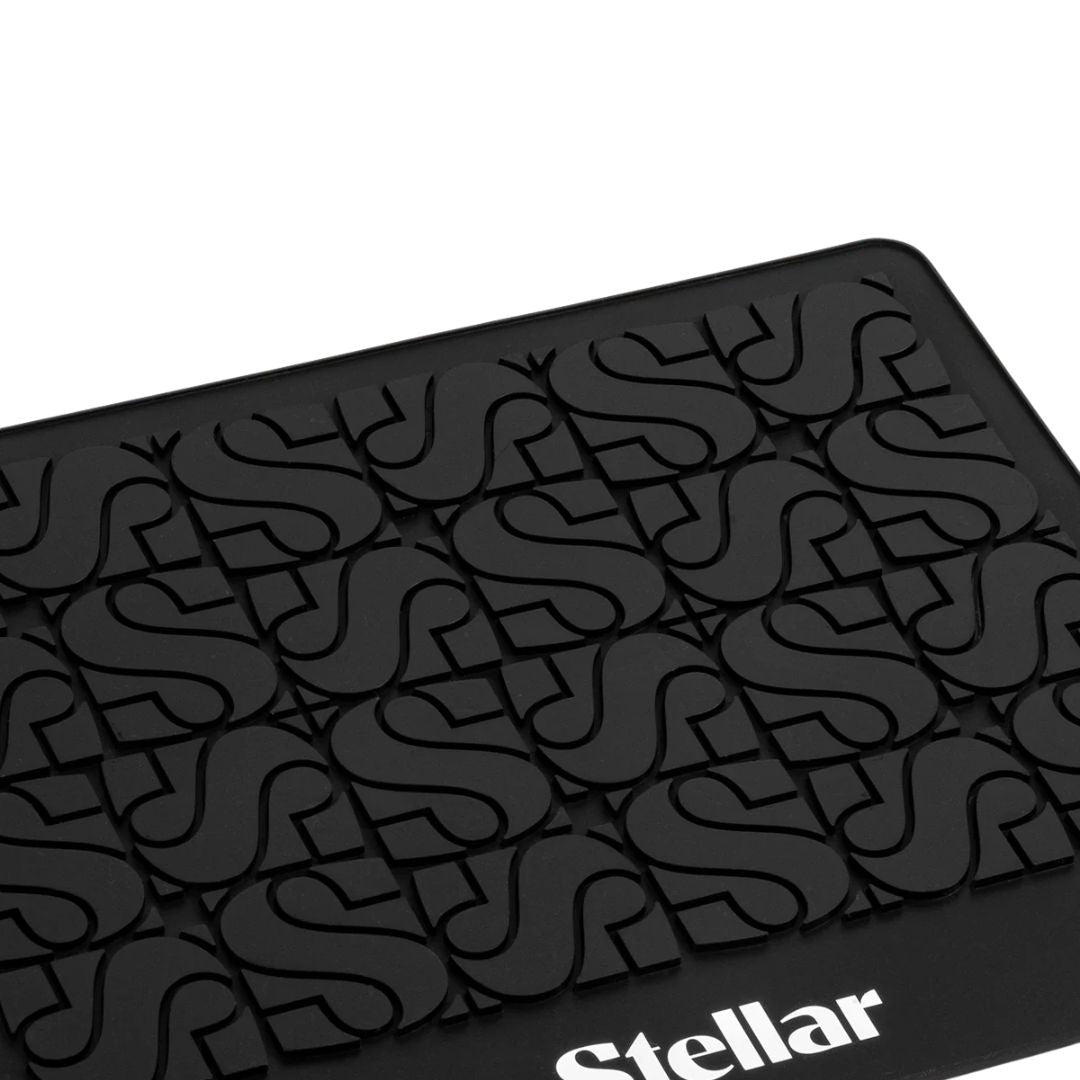 Black textured mat with 'Stellar' branding on a white background