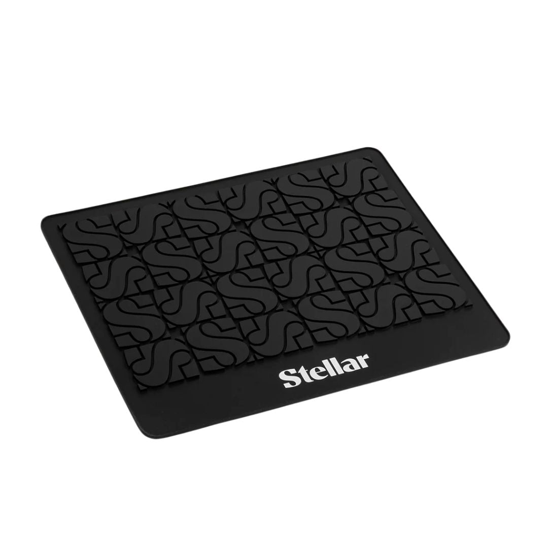 Black textured mat with 'Stellar' branding on a white background