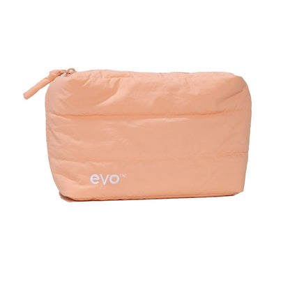 A peach-colored puffy zippered pouch with the brand name 'evo' printed in white near the bottom left, set against a plain white background.