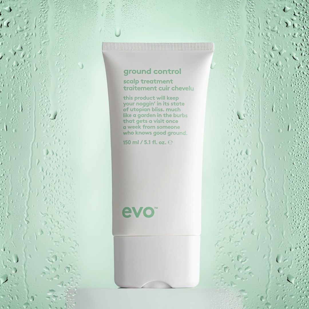 Evo ground control scalp treatment tube on a textured green background