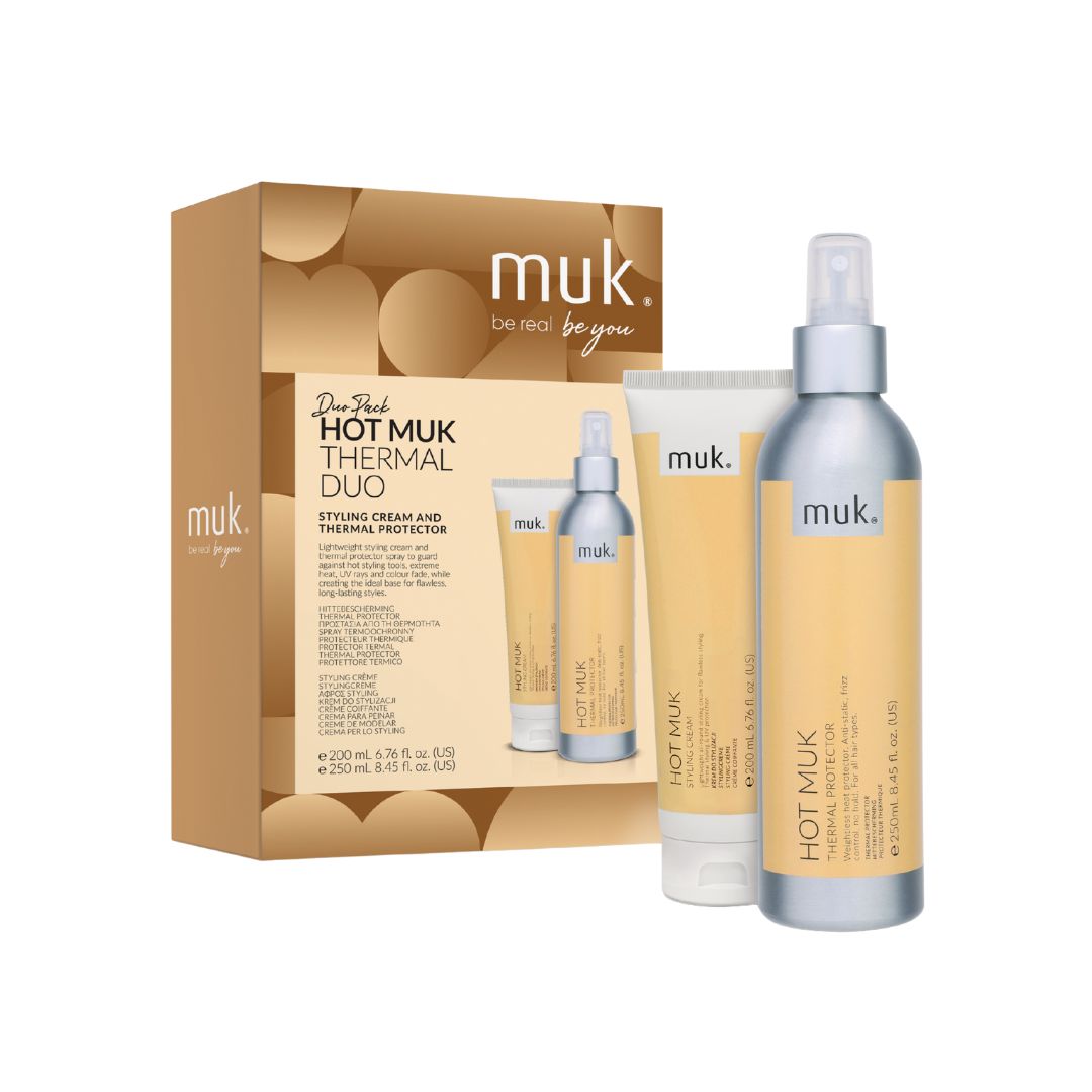 Muk hair care product set including bottles and packaging on a white background