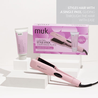Pink hair straightener with 'muk' branding on a white background